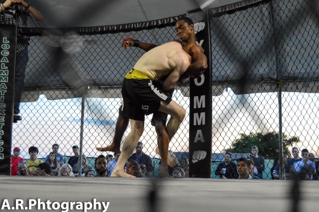 Vince Wadman attempts a takedown on Ryan Hawkins. (Photo: Adam Rose/A.R.Photography)