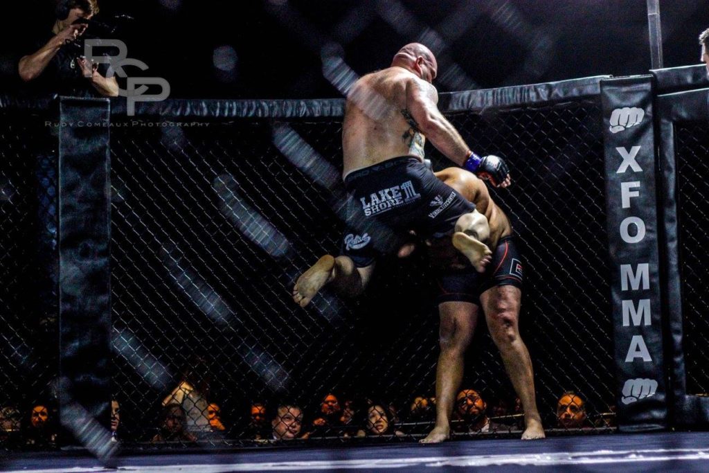 Brian Peterson flying knee at XFO 60